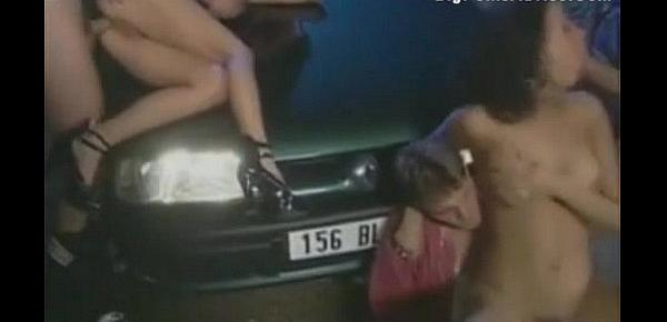  90s porn filmed on hood of car outdoors